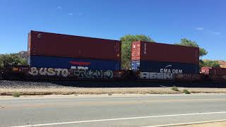 UP 8881 leads Westbound Stack/Baretable Train passes through Beaumont CA