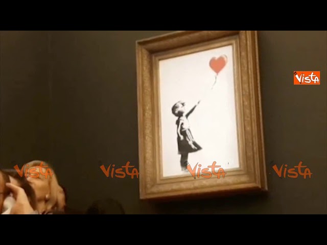 Banksy svela come ha progettato di distruggere il quadro da 1 milione di  sterline 