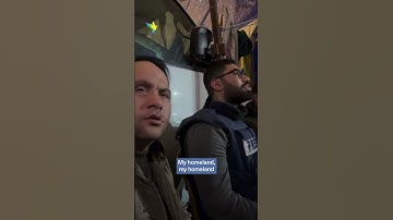 Thumbnail of Palestinian journalists sing after Israeli airstrikes