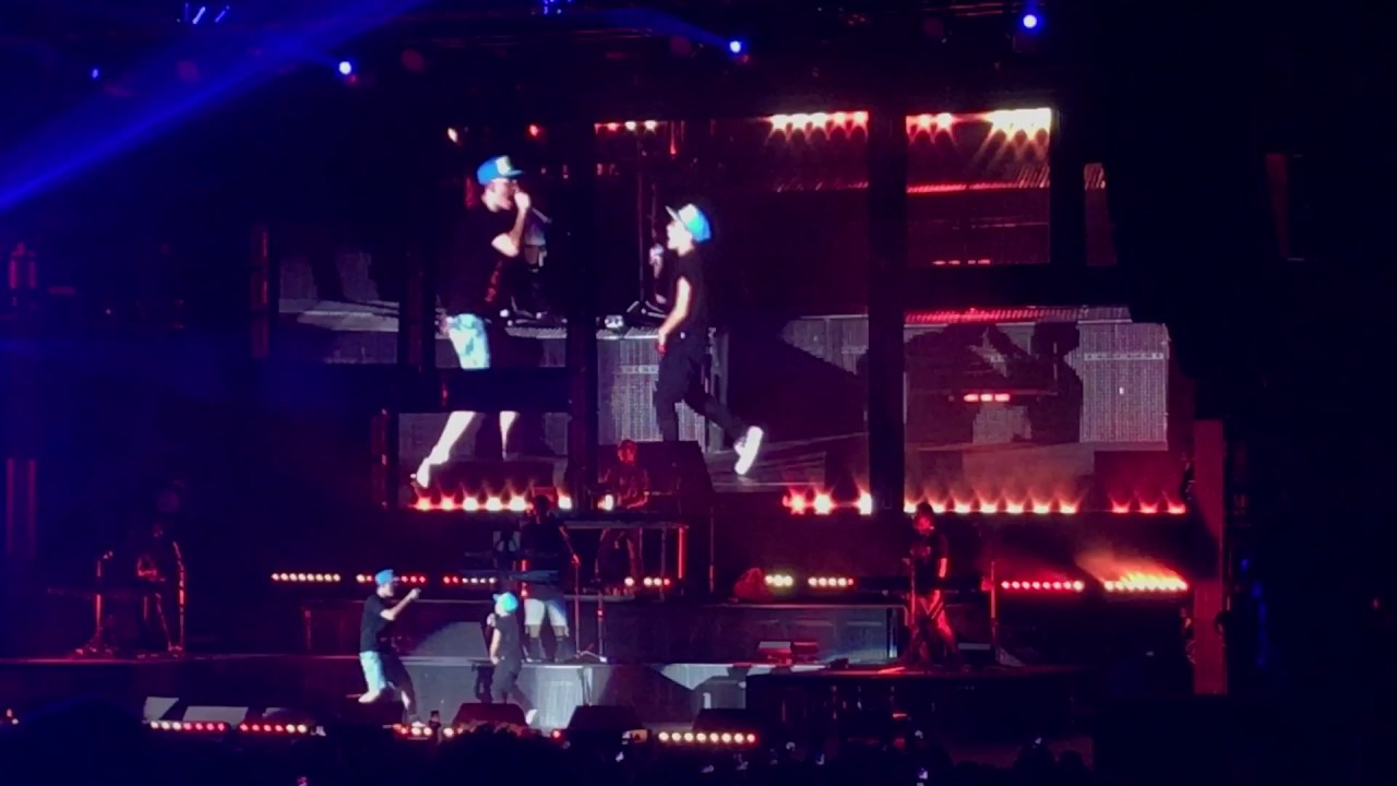 Logic has 11 yr old rap Flexicution with him on stage - YouTube