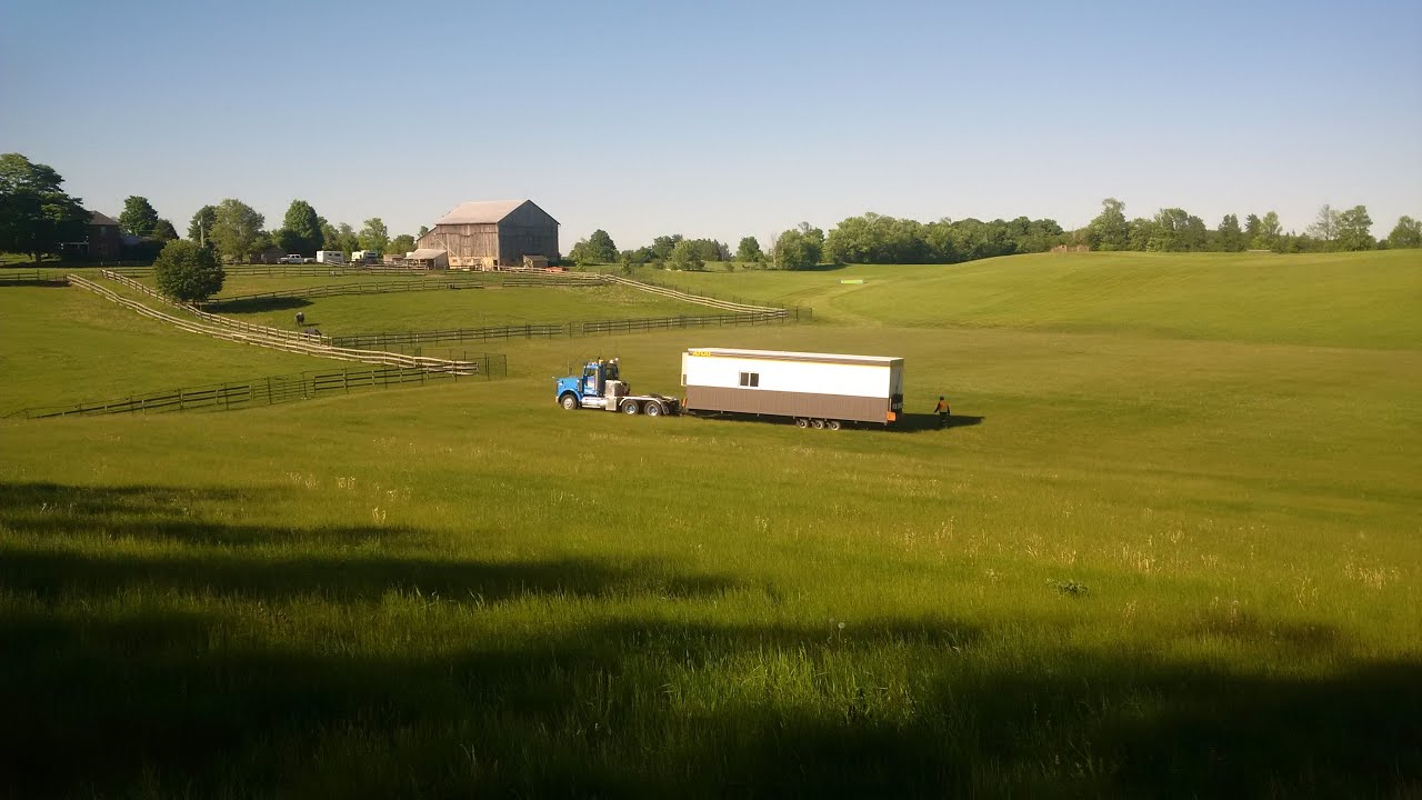 Modular Transport Canada delivers a medical trailer to a Pan Am Equestrian Center