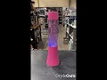 Lyserød glitterlampe med farvet lys