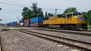 A SINGLE SD70M IS HANDLING THIS EAST BOUND STACK TRAIN