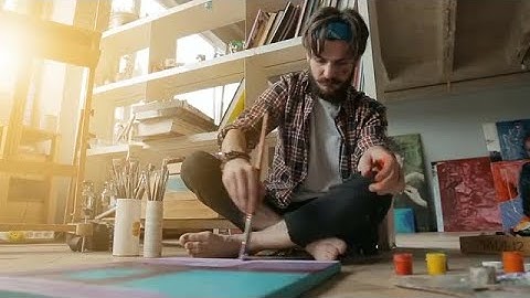Artist Paints Picture On The Floor Stock Video