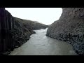 Basalt columns guide this river in iceland
