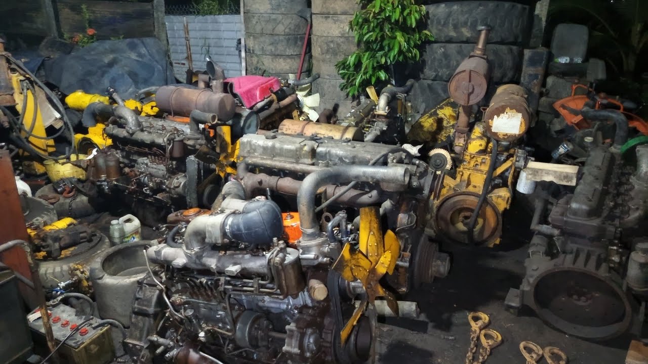 (còn 1 isuzu 6bb1) 6 động cơ Isuzu 1tấc02, Komatsu 1tấc05 Nissan 1tấc33 : 0903003900 Trung