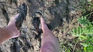 strappy heels and barefoot in river farm mud and sloppy marsh muck
