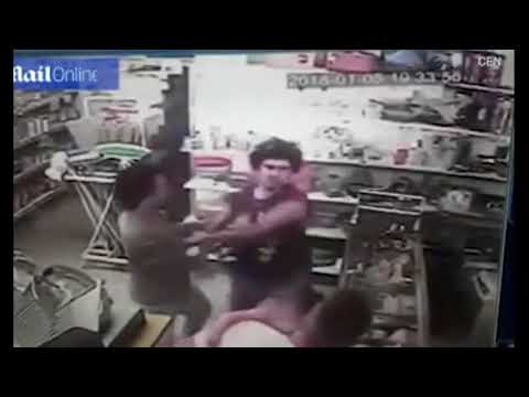 Shocking moment baby punched in head during fight between two men