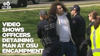 Video shows officers detaining man at OSU encampment