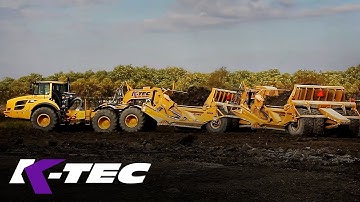 K-Tec 1233 ADT Trains Scraper Unoading Clay