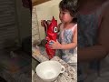 Chloe Happily Poured the Doritos Herself and Got Started Right Away.