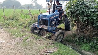 Farmtrach 45 Tractor Stuck in Mud Canal Rod