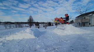 Polaris 120 snowmobile big jump