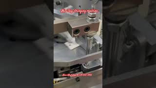 Mini tag stringing machine