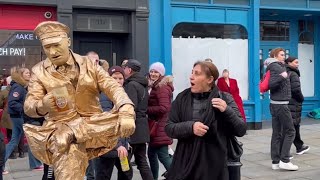 Introducing the old naughty gold man statue.