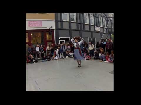 A Ukranian dancer performing on the street.