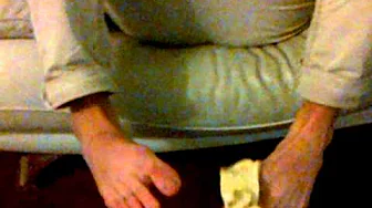 F**k Evolution! Peeling a banana, with his feet.