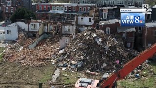 Fire-damaged condemned rowhomes being demolished in Lancaster