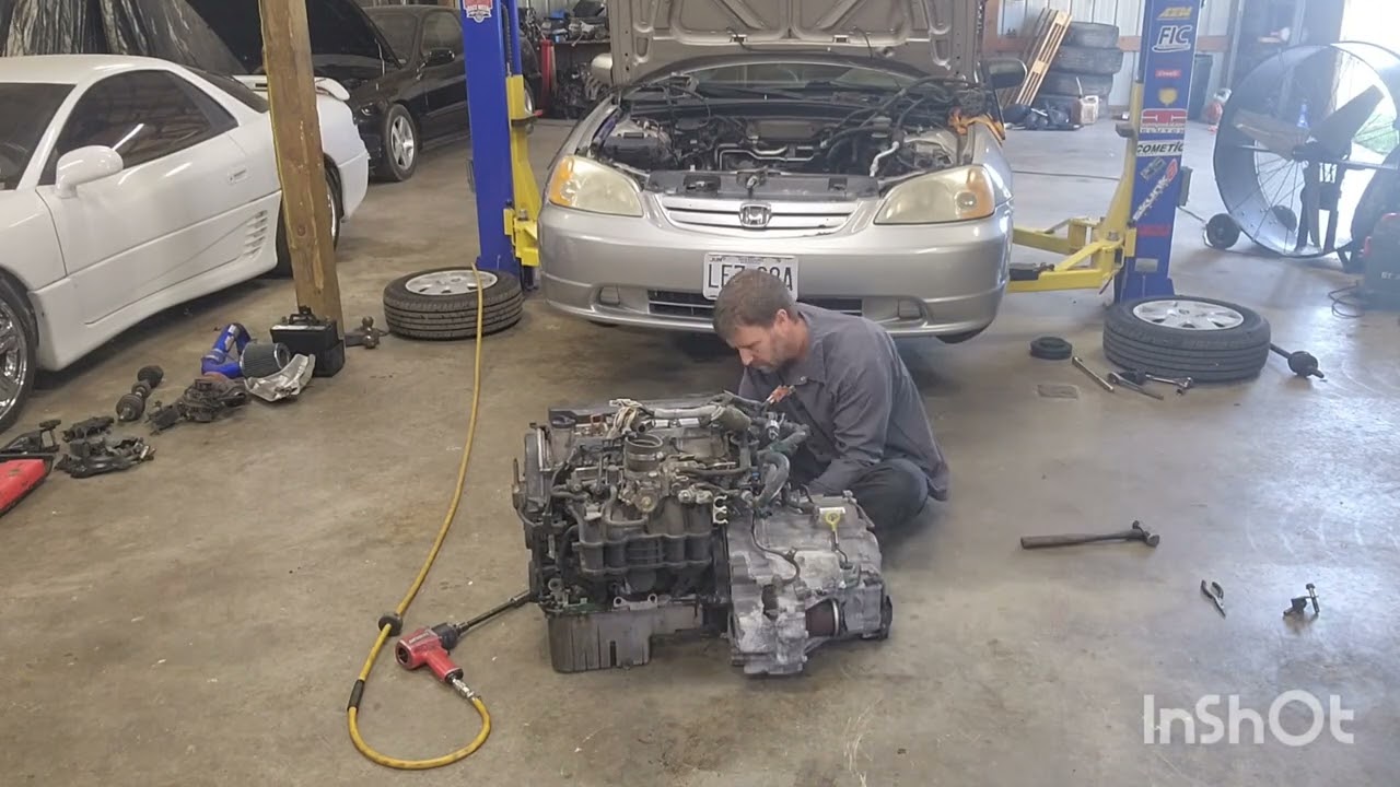 JDM transmission swap on this 2002 Honda Civic.