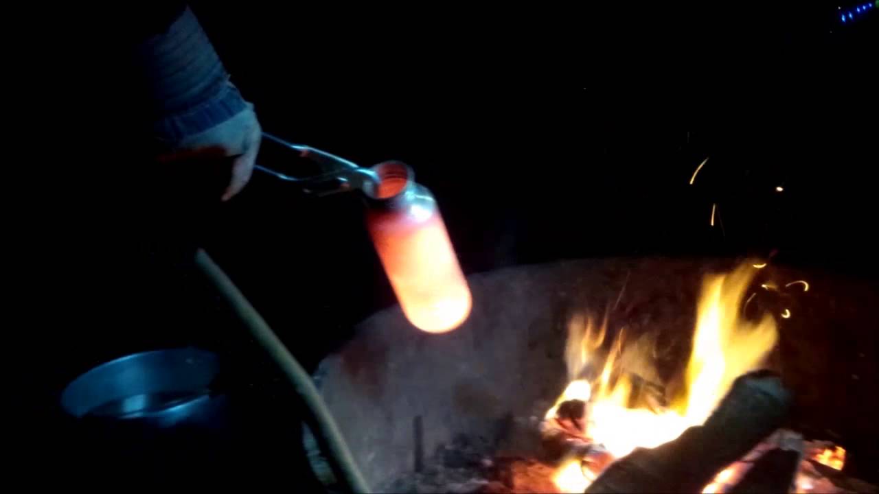 Aluminum melting in a camp fire YouTube