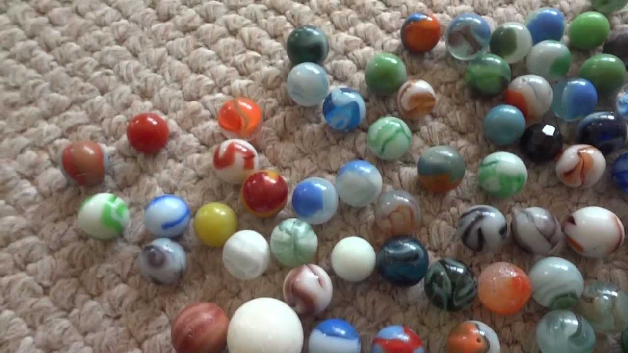 How do you identify and price vintage marbles?