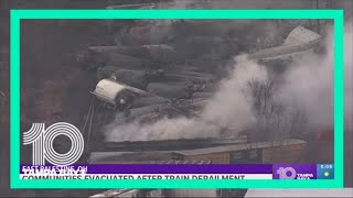 Ohio emergency officials releasing toxic chemicals from derailed tanker cars