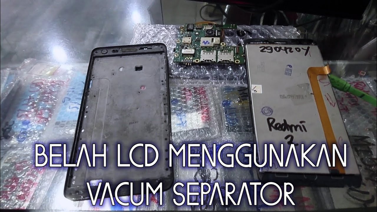 BELAH LCD DENGAN VACUM SEPARATOR