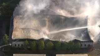 Fire burns at Premier Office Installations in Flat Rock