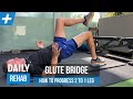 How to Progress a Glute Bridge from 2 to 1 Leg | Tim Keeley | Physio REHAB