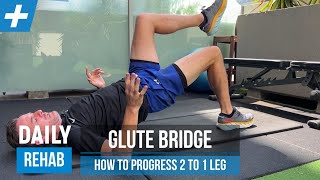 How to Progress a Glute Bridge from 2 to 1 Leg | Tim Keeley | Physio REHAB