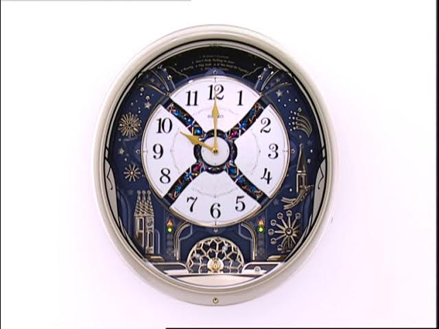 Seiko Melodies In Motion Musical Wall Clock With Decorative Swarovski  Crystals QXM239S - YouTube
