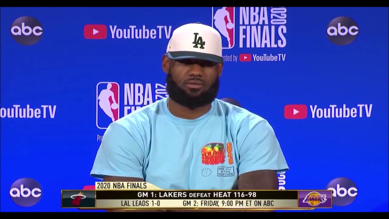Reporter informs Lebron James that two of his rookie basketball cards bid for $1.8M and $900K