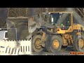 4k volvo l70h spreading out and flattening gravel