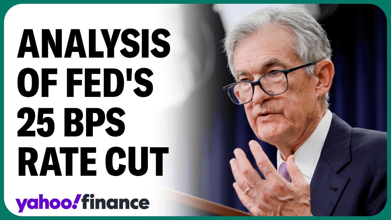 Fed cuts rates by a quarter point - YouTube