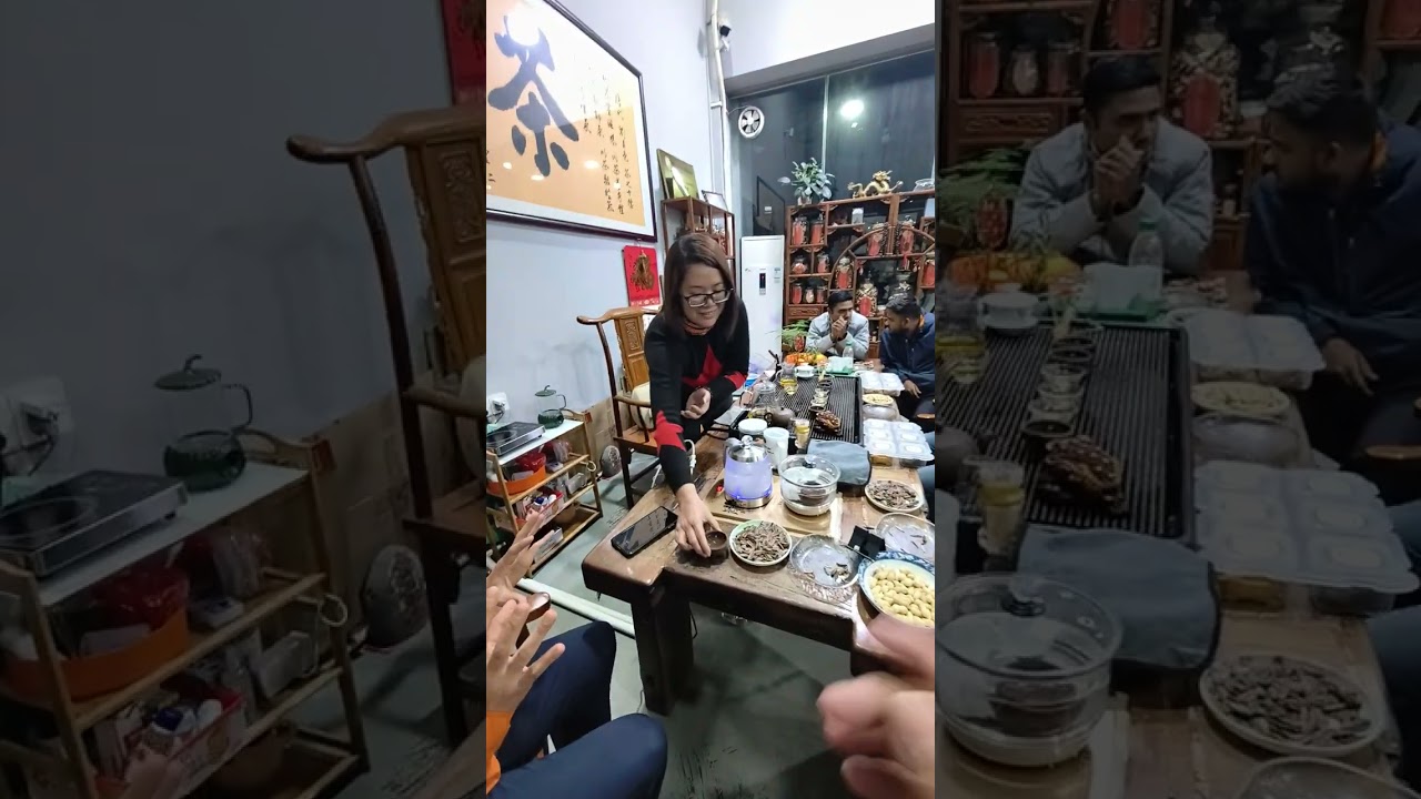 A Chinese lady serving special Chinese Tea made of orange peel. Very healthy drink