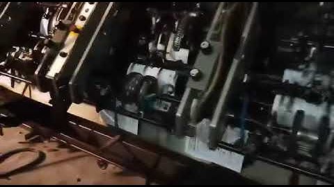 HEIDELBERG STITCH MASTER FLOW LINE MACHINE WITH THREE KNIFE TRIMMER