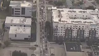 Stalled trains block Houston roads for hours as city works on fix