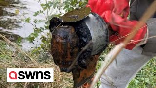 Magnet fishermen pull GRENADE from canal | SWNS