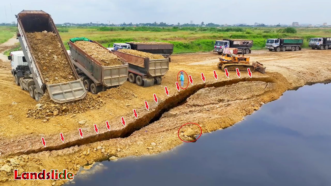OH ho Great Work!! Komatsu D53P Bulldozer Pushing Stones Filling Sink Land With  25.5T Dump Trucks
