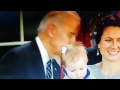 WHAT IS BIDEN DOING TO THIS BABY?