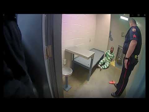 Police Officer Arrested After Pushing Handcuffed Man In Jail Police Brutality - Caldwell Texas