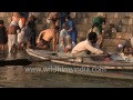 Cremations on Ganga Ghats add pollution to the Holy river in Varanasi