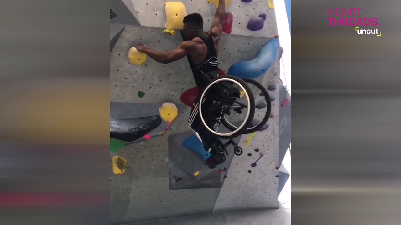Man in wheelchair scales climbing wall YouTube