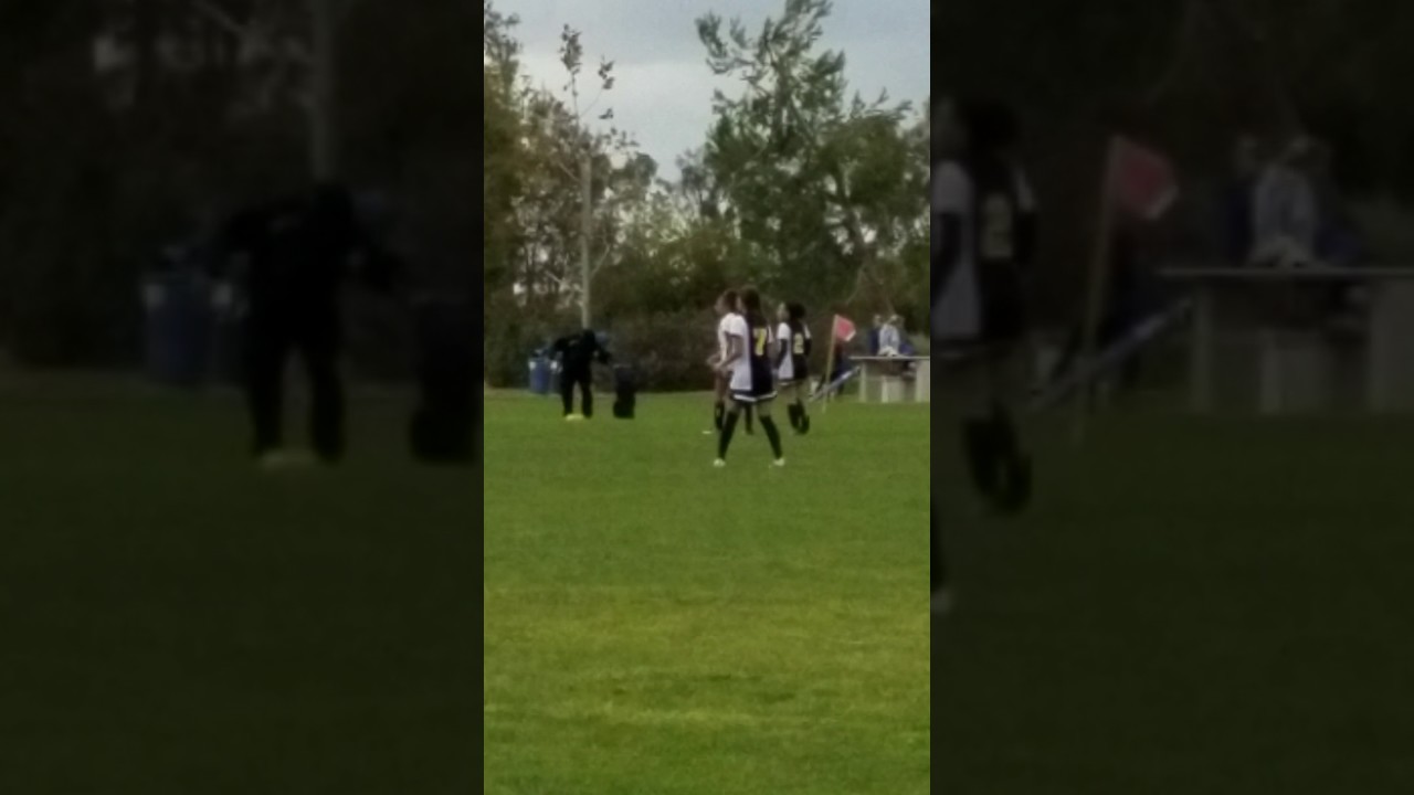 Kaylei playing soccer