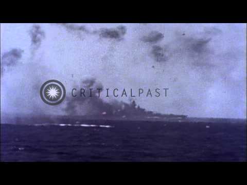 USS Tennessee struck by Kamikaze , off Okinawa, during World War II HD Stock Footage