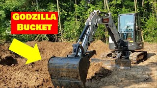 My biggest pond everthe new 36' Godzilla bucket on the Bobcat e42 mini excavator PART 1