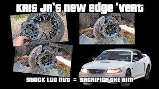 Jr's convertible. Sacrificing a rim to work on the front suspension. 