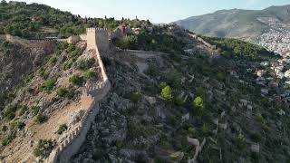 Turkey, Alanya Castle (Kalesi). Beach, sea, greens panorama view. Drone video. HD 4K