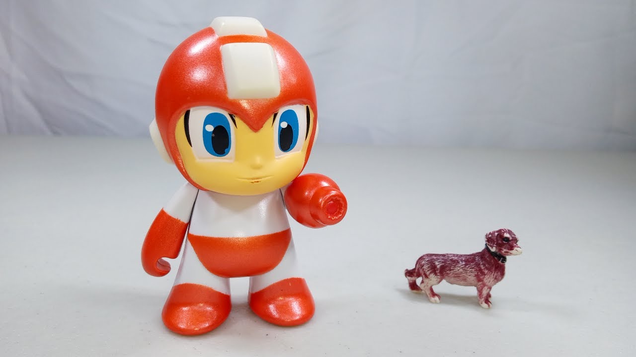 Unboxin Doxin - Capcom Kidrobot Metallic Orange Mega Man Figure