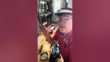 Sharpening curved scissors on a twice as sharp machine